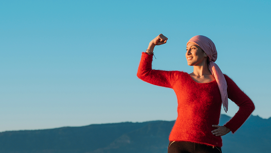 Woman posing strongly outside image