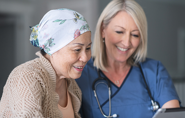Woman with a headscarf, next to a healthcare professional image