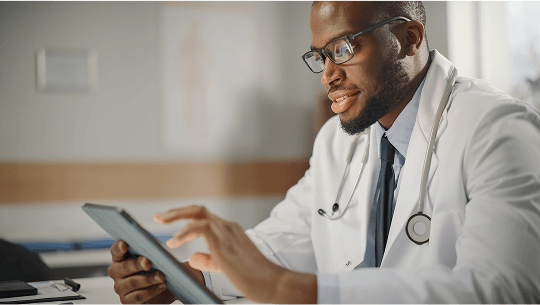 Healthcare profeesional using a tablet image